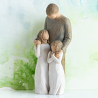 Willow Tree My Girls, 8"h hand-painted standing resin figure of father with arms around two young girls, all in neutral clothing, in front of green painting