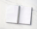 Inside view: inside spread of notebook, showing lined text-weight pages
