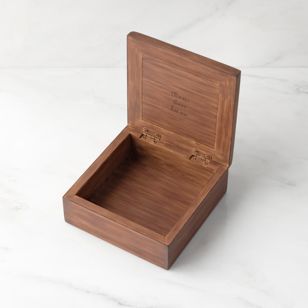 Dark brown box open to show inside reads "Always there for me