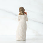 Back view of brunette girl wearing white dress standing up