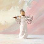 Willow Tree Angel of Harmony, 6"h hand-painted standing resin figure in cream dress with wire wings, playing the flute, in front of pale pink painting